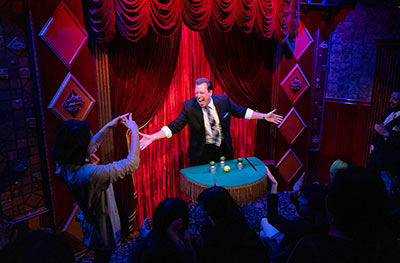 John Shryock performs with the Carnival of Illusion Theater